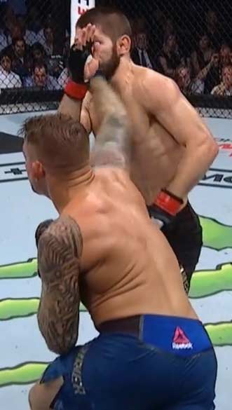 Dustin Poirier punches Khabib Nurmagomedov